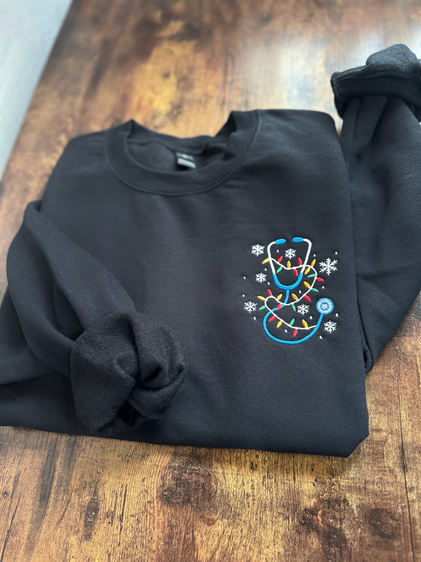 Embroidered Holiday Lights Stethoscope Crewneck Sweatshirt
