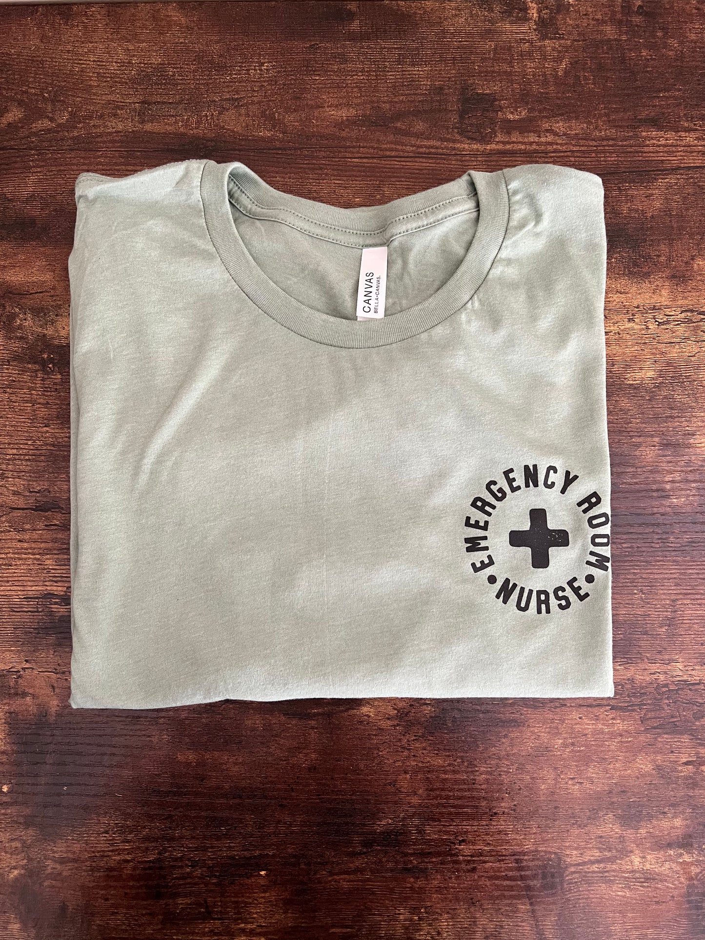 Emergency Room Nurse (circle image black) Short Sleeve T-Shirt (Bella Canvas)