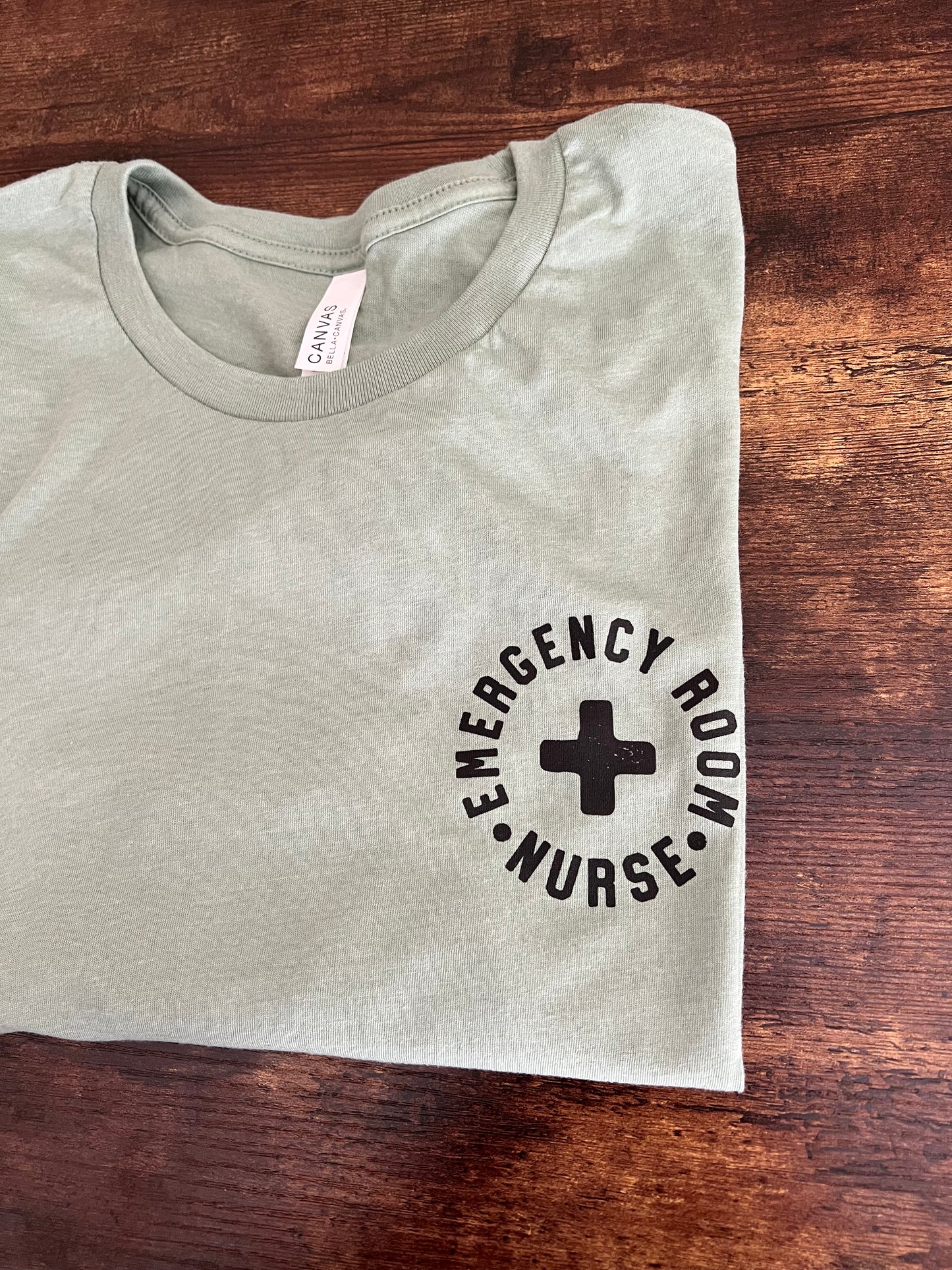 Emergency Room Nurse (circle image black) Short Sleeve T-Shirt (Bella Canvas)