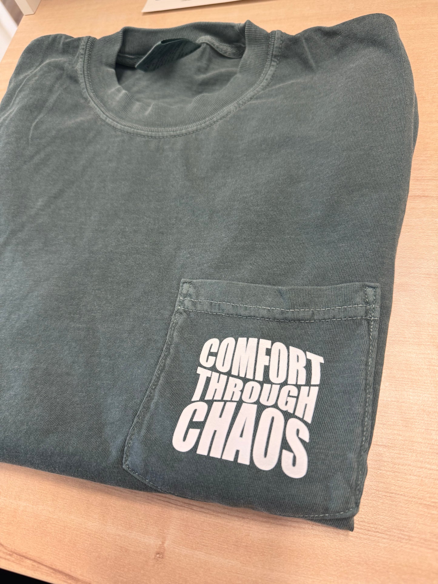 Comfort Through Chaos Pocket T-Shirt