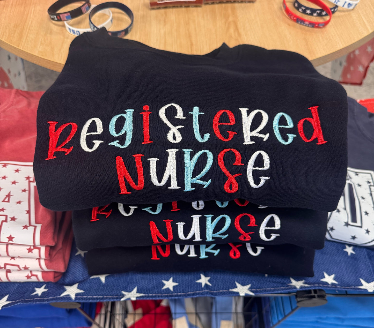 Red, White & Blue Embroidered Registered Nurse Crewneck Sweatshirt